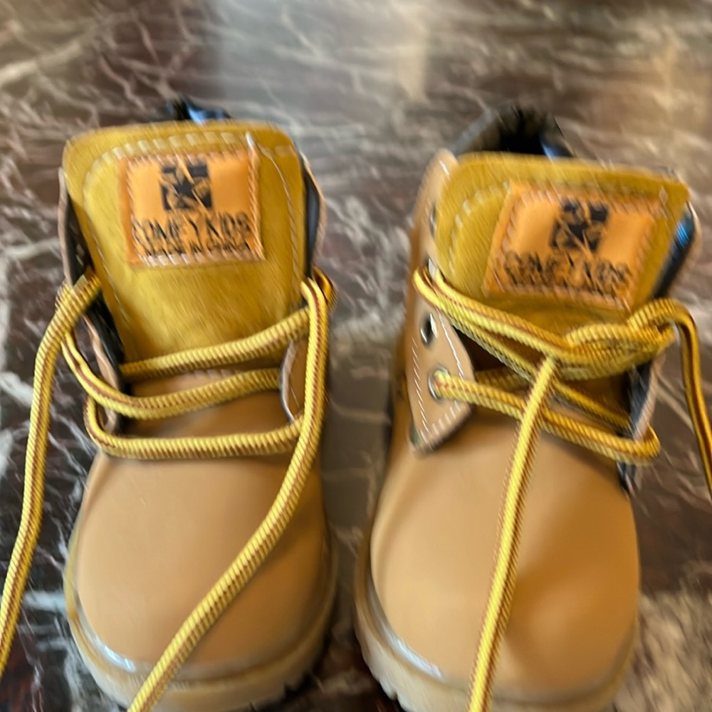 Cute work boots never worn too small for my grandson